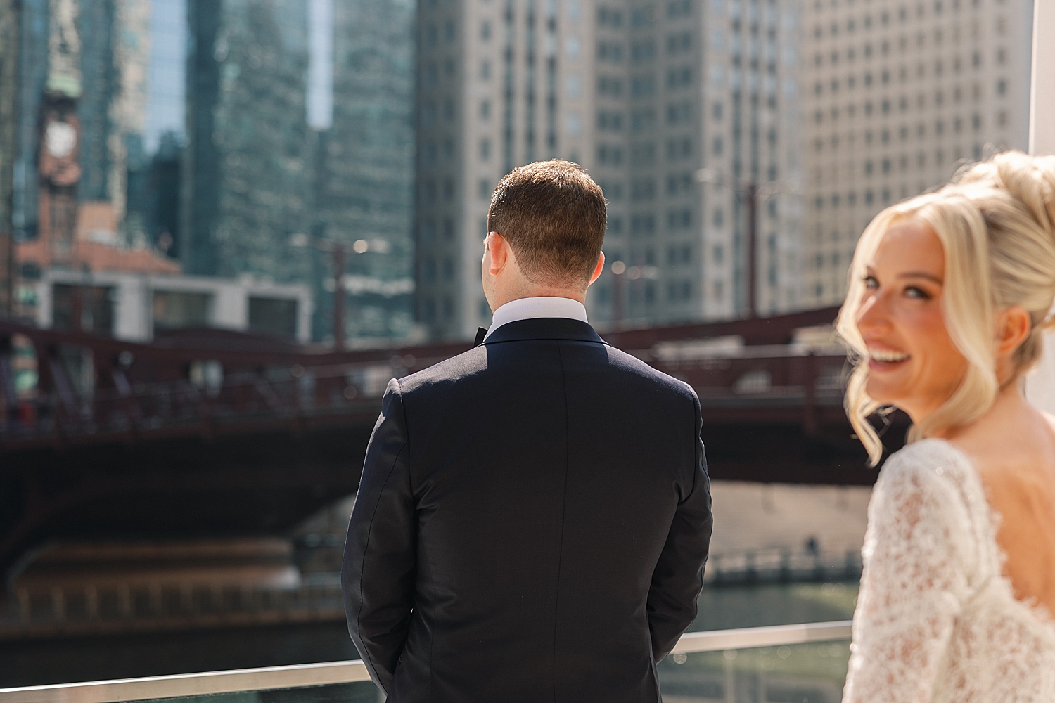 woman approaches man for first look by Chicago luxury wedding photographer
